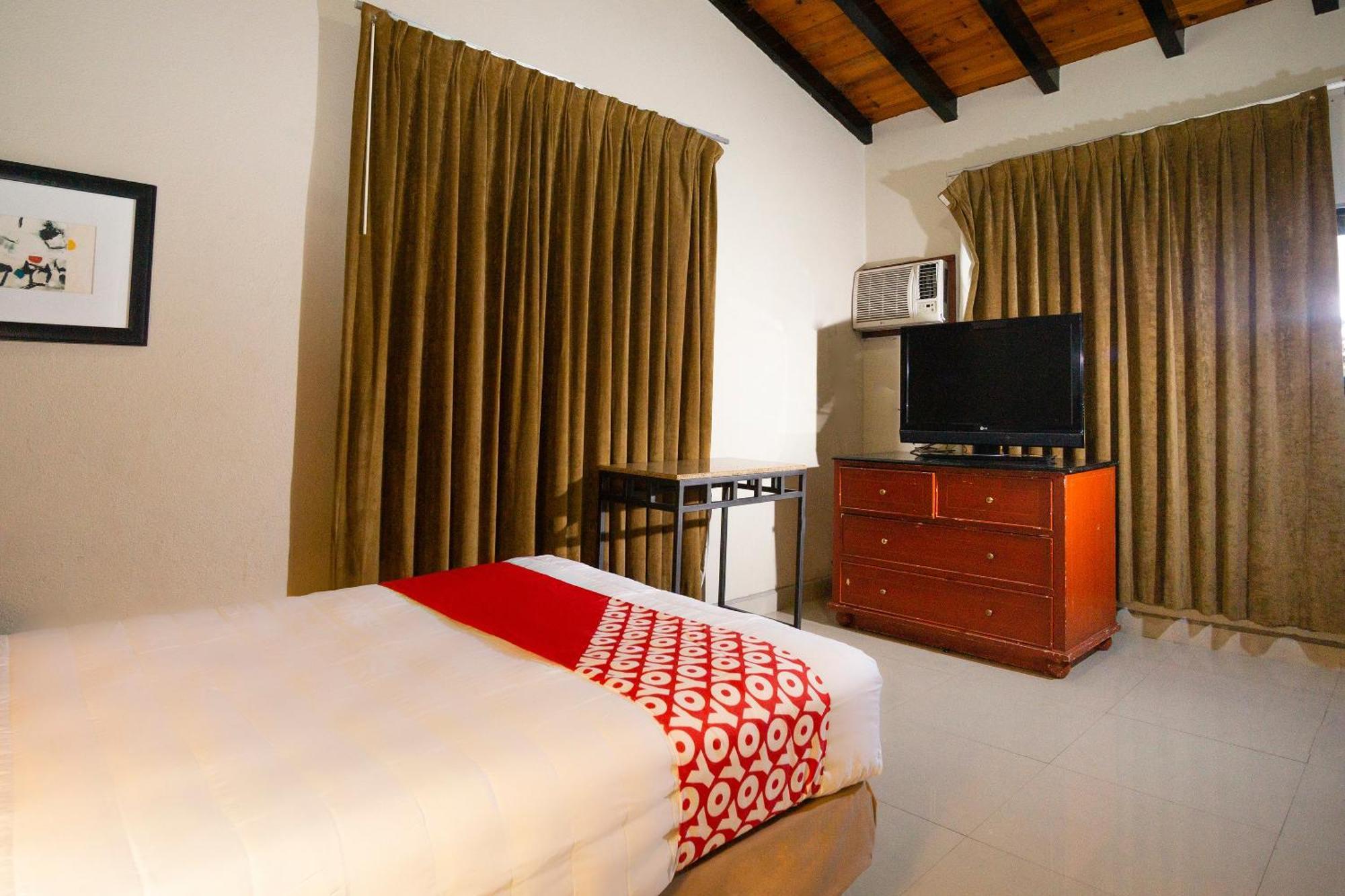 Oyo Hotel Hacienda Don Luis, ロサリト エクステリア 写真 A room at the hotel